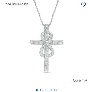 1/4 CT. T.W. Diamond Cross with Infinity Pendant in Sterling Silver.